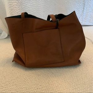 Reversible vegan leather tote bag from Urban Outfitters